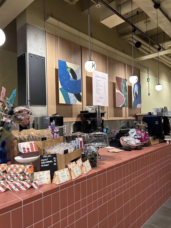 Bild på kaffekopp och chokladbollar